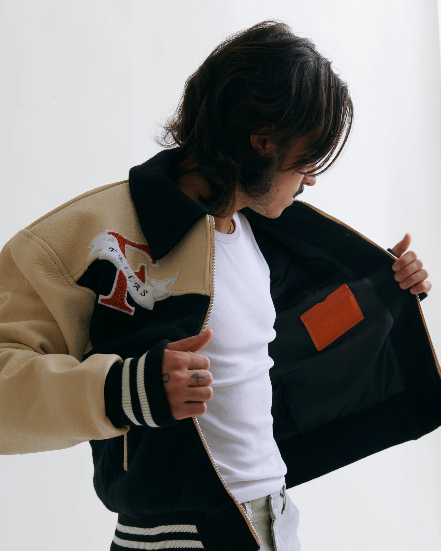 LEATHER EMBROIDERED VARSITY JACKET FELLASBYHAQI.COM